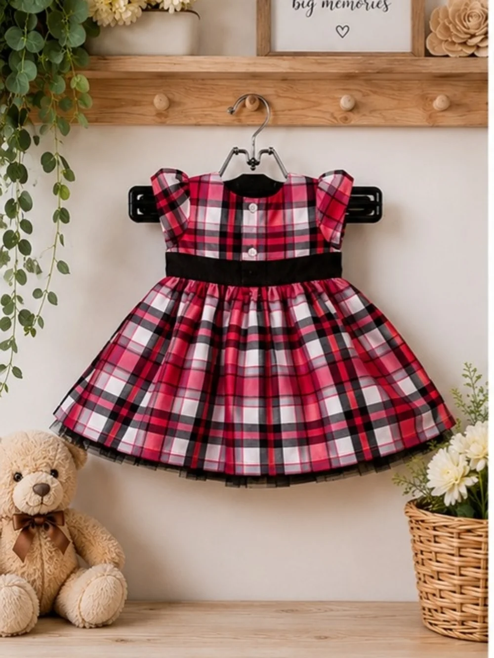 Carter's red, black, and white plaid holiday dress features a black satin waist